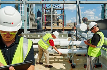 Aramark employees in white hard hats